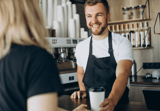 A Staffer serving coffee